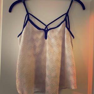 Cream top with black trim